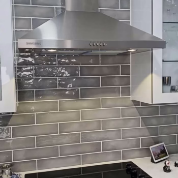Expert handyman services for kitchen remodeling and home improvements in Miami Handyman in Miami remodeling a kitchen with modern fixtures and sleek design