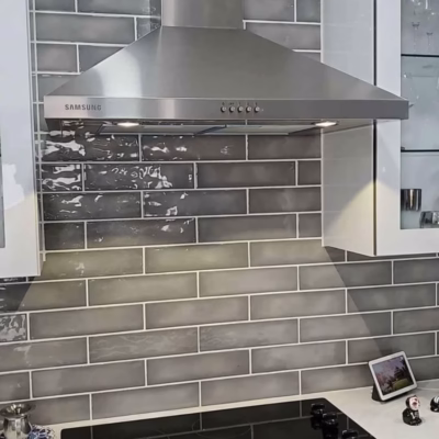 Expert handyman services for kitchen remodeling and home improvements in Miami Handyman in Miami remodeling a kitchen with modern fixtures and sleek design