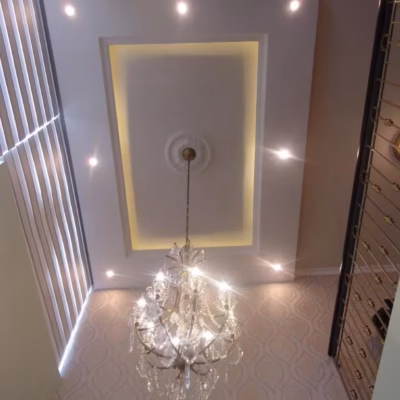 Elegant chandelier and recessed lights installed by a Miami handyman Handyman chandelier install with recessed ceiling lights in Miami, Florida